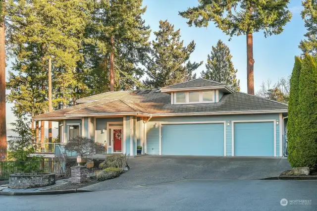 Tucked at the end of a peaceful side street off a cul-de-sac, this home features a 3-car garage, ample driveway parking, and a convenient guest parking spot on the left.