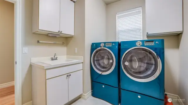 Main level laundry room leads out to the 3-car garage.