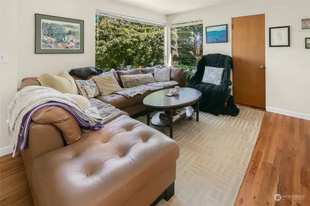 Unit 2220 ~ Bright living room with oak hardwood floors throughout.