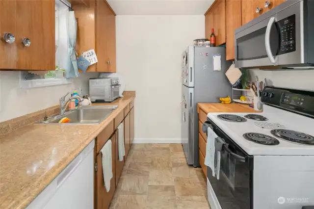 Unit 2220 ~ Kitchen with  updated counters and cabinets.