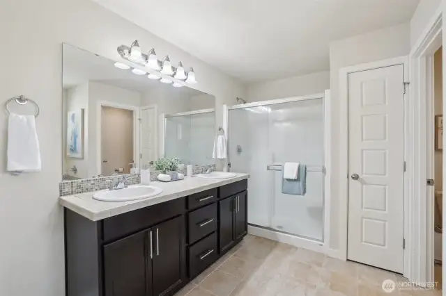 Primary Bathroom with closeted toilet
