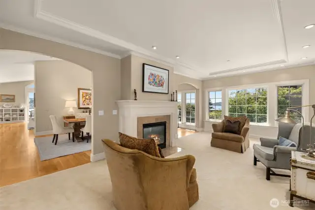 Living room with fireplace and view of Lake Washington and Mt. Rainier