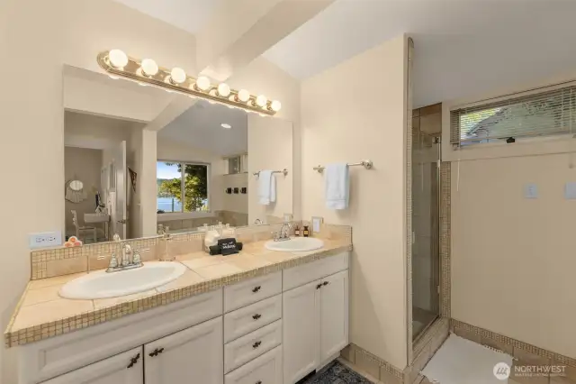 Bathroom of second Primary bedroom suite with jacuzzi bathtub and shower
