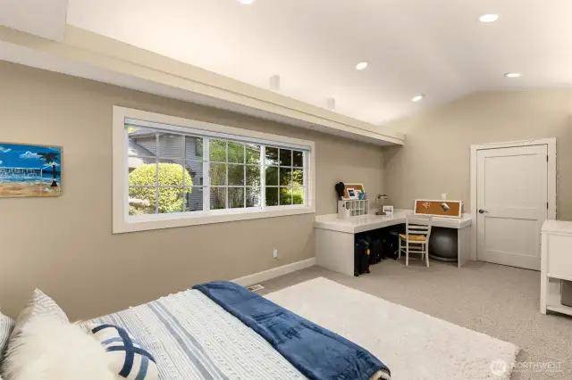 Large Guestroom with walk in closet and assessible desk.