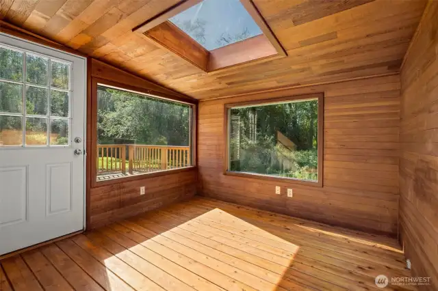 Dining room, office, hobby, play room etc... door leads out to large deck.