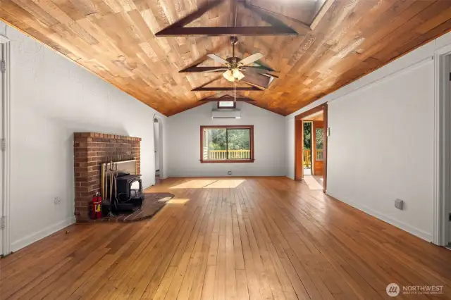 Great room. Original fir floors. Lopi Stove with blower. Mini-split for heating/cooling.