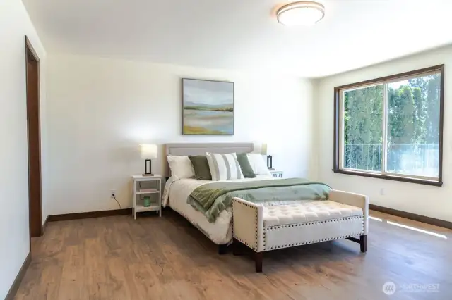 Upstairs spacious primary suite.