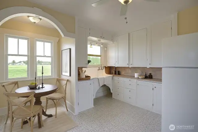 Super cute kitchen with so much charm is virtually staged.