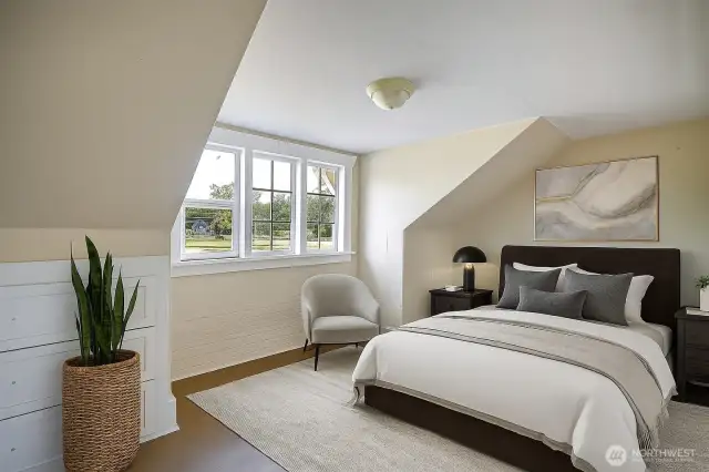 Upstairs bedroom, with built in drawers and walk in closet, is virtually staged.