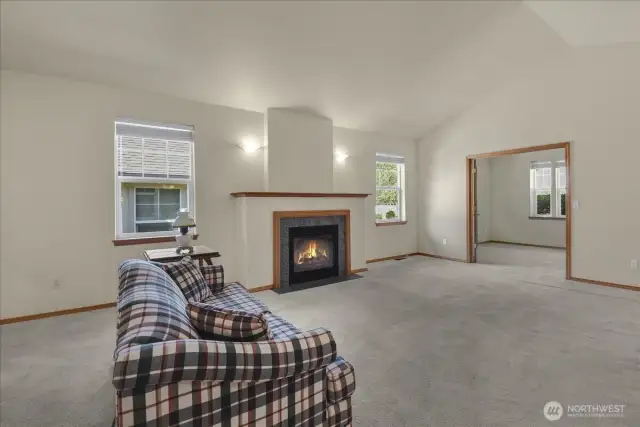 There is a spacious den off of the living room/great room.