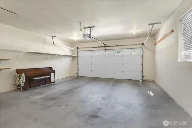 The 2 car garage has a garge door opener.  There is no steps from the garage to the home.