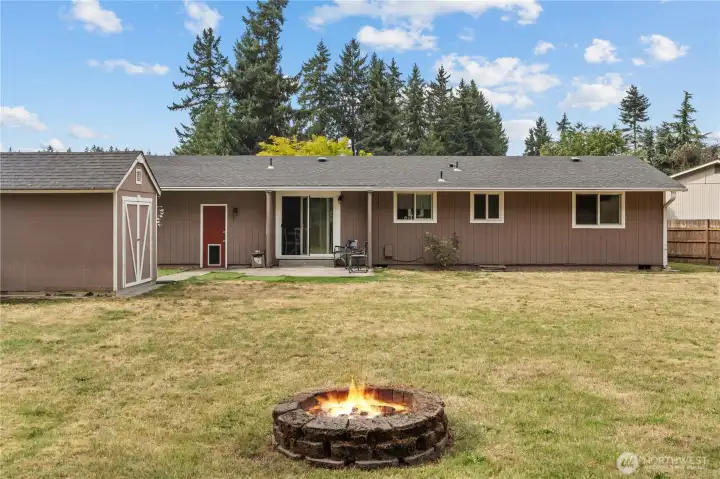backyard with Shed & fired-it