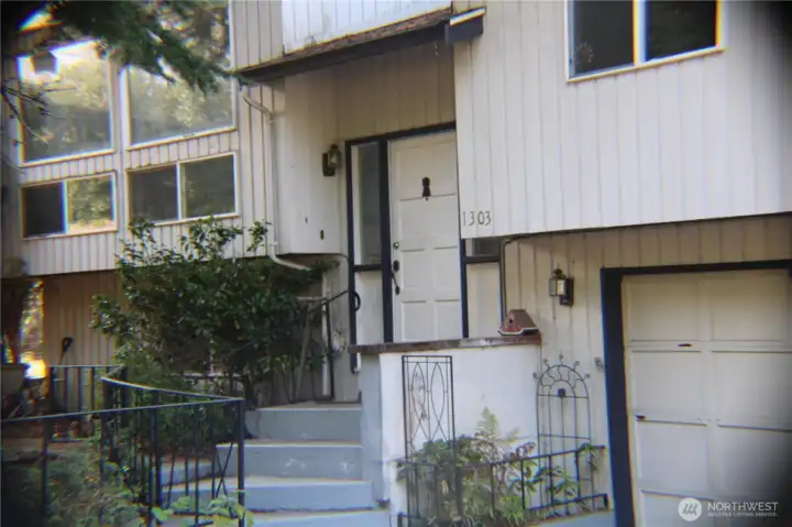come on in, notice the huge living room windows!!
