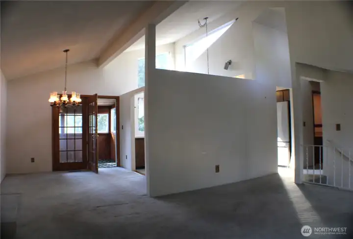dining room with kitchen and coffee room entrance-look at those Kitchen windows!