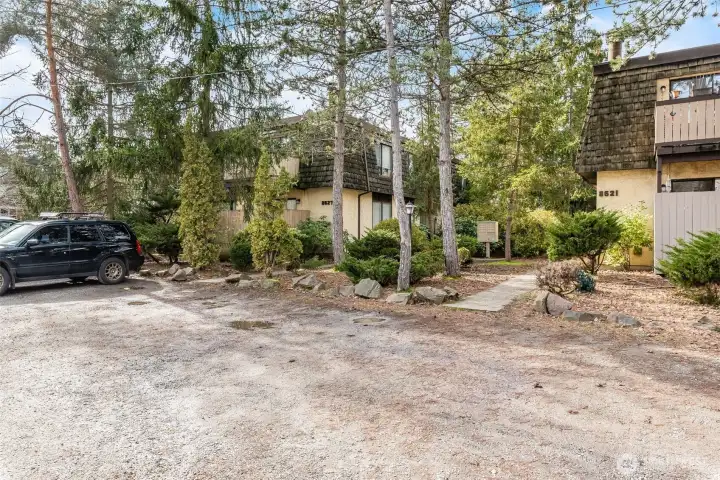 In the front of the building is a huge graveled area for guest parking!