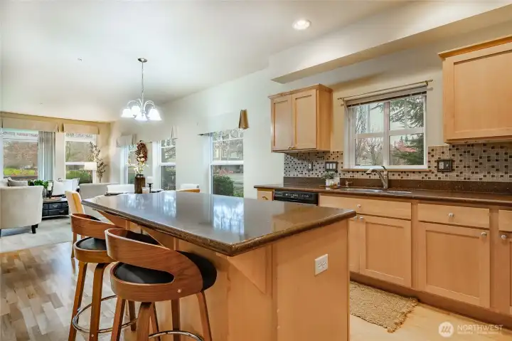 Kitchen with granite countertops and large island