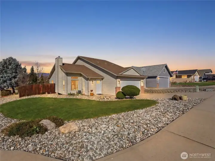 Welcoming front exterior of this 2-story home on a desirable corner lot with great curb appeal