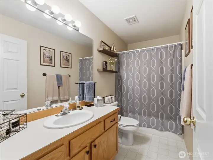 Upper level full bathroom with convenient access to bedrooms