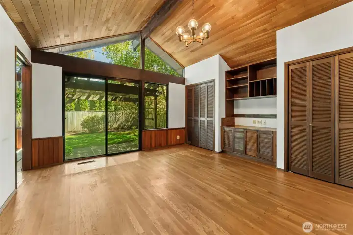 Bedroom/Den has built-in and opens to one of the back patios