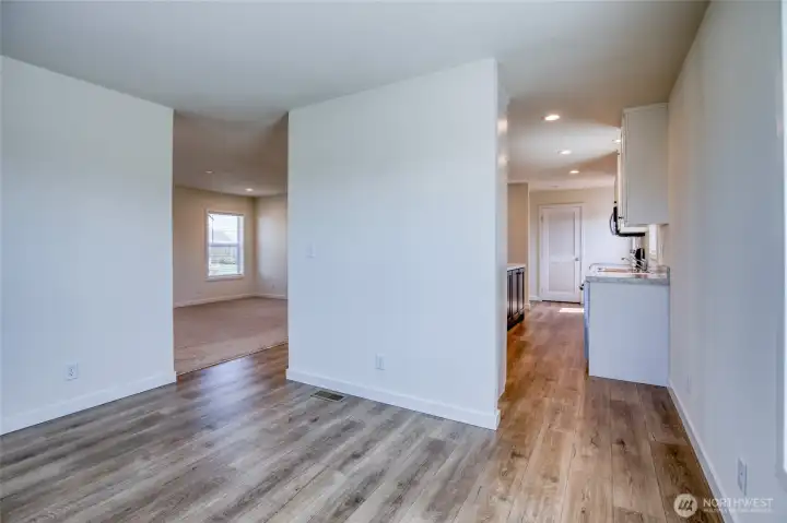 Dining area looking back towards kitchen and living area.