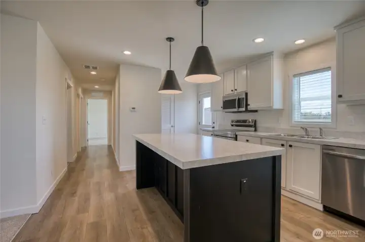 Looking down the hallway towards the bedrooms.