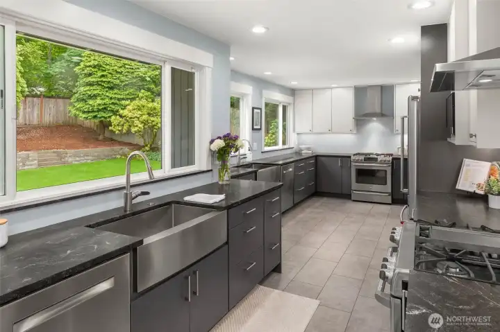 Oversized double chef’s kitchen flows seamlessly into the inviting family and dining rooms, creating the perfect setting for everyday living and effortless entertaining.