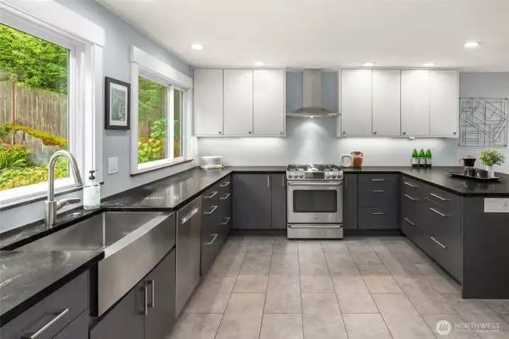 Oversized double chef’s kitchen flows seamlessly into the inviting family and dining rooms, creating the perfect setting for everyday living and effortless entertaining.