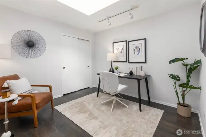 One of 4 spacious bedrooms or could be used as an office as shown.