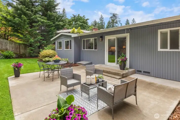 Huge level, park-like lot with patio right off the kitchen/dining room. Great for entertaining!