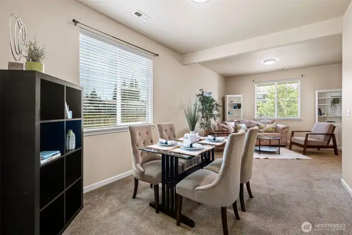View of dining room and family room from kitchen.