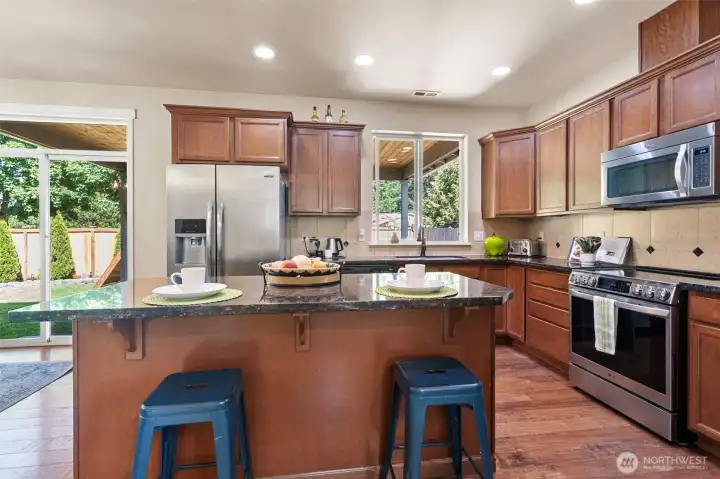 Eat-in bar area of island in kitchen.