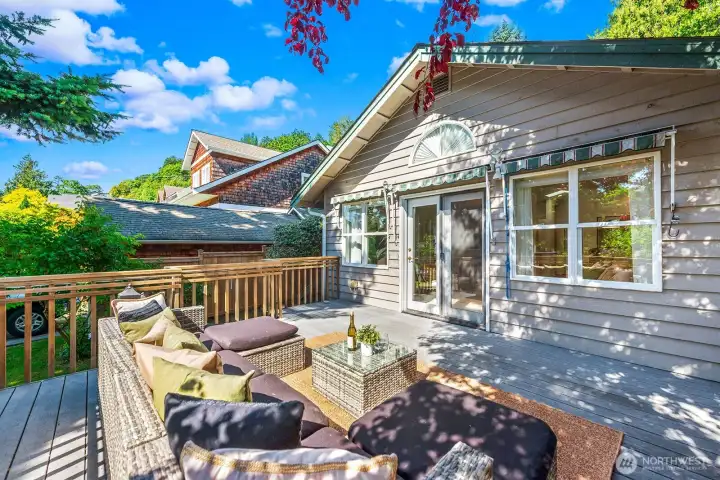 There's a large deck on the front of the home, that you can access through these French doors in the living room.