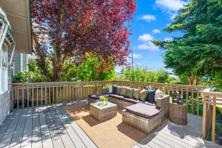 Look out at beautiful trees while you relax or entertain on the deck.
