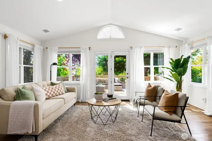 This is the large living/seating area - open the French door to the deck and you can have a great indoor/outdoor living space!