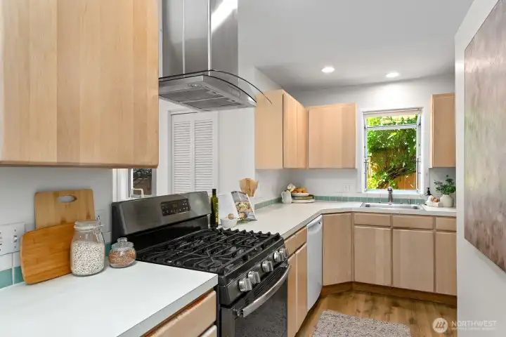 There's a garden window over the kitchen sink - a great place for plants and potted herbs!