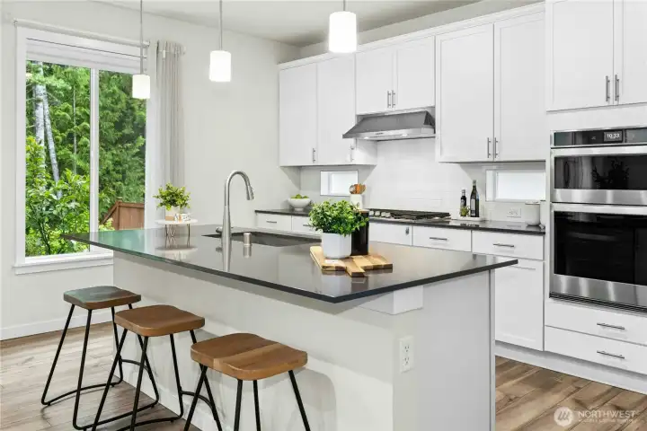 The kitchen island is great for cooking prep and casual dining. The kitchen island is great for cooking prep and casual dining.