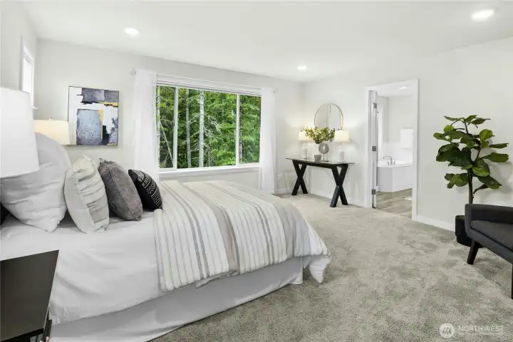 The spacious primary bedroom. The spacious primary bedroom.