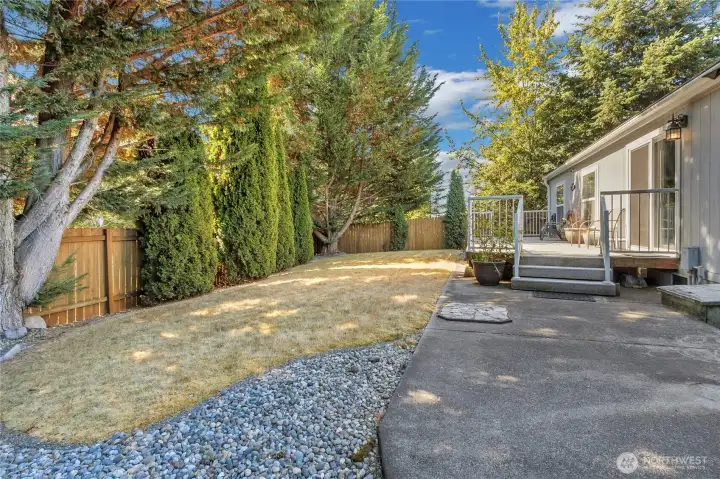 Easy to maintain fenced backyard, with gates at each side. Easy to maintain fenced backyard, with gates at each side.