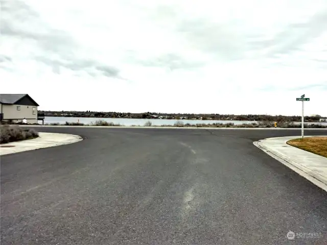 From Rd 4 NE looking east towards lake. Waterfront Lot 7 is to the right of the middle of the road.