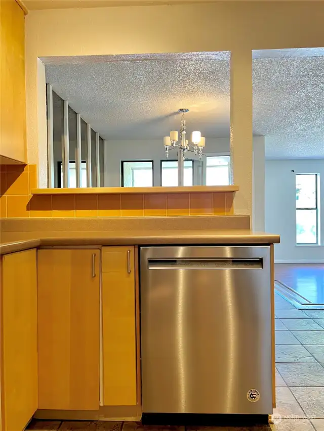 A pass-through to the dining room really opens up the kitchen