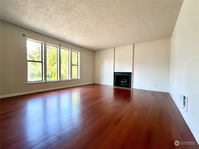 Beautiful, easy-care engineered hardwood floors add an elegant touch.