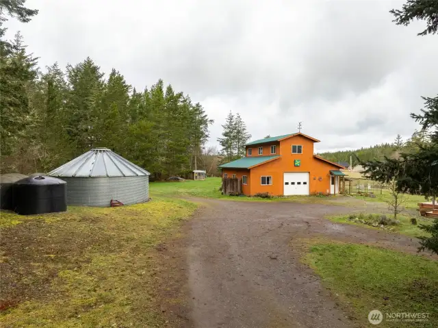 Catchment storage (35,000 gallons) and barn