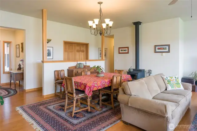 Main house, with entryway on left, doors to den, great room with dining and living area