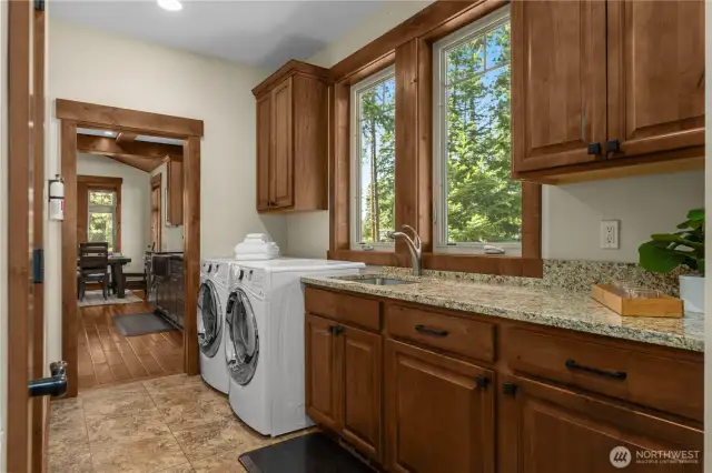 Perfectly placed laundry room with ample storage space.