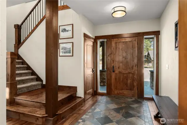 Slate-floor entry and extra large coat and storage closet.