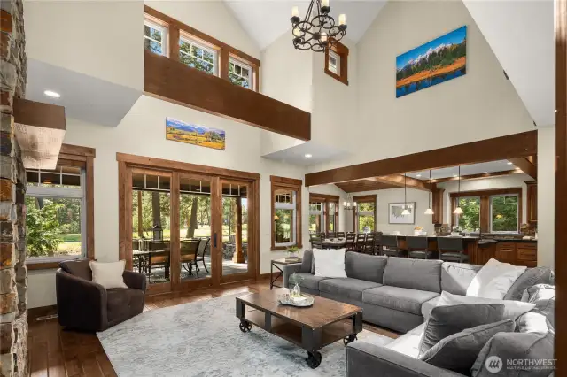 Tons and tons of natural light flood the living room, dining room, and kitchen!