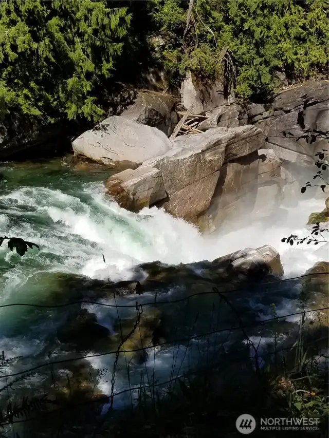 River chute by steel bridge