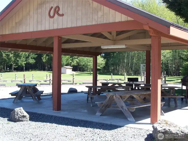 Community picnic shelter next to caretaker cabin & ball fields. playground.