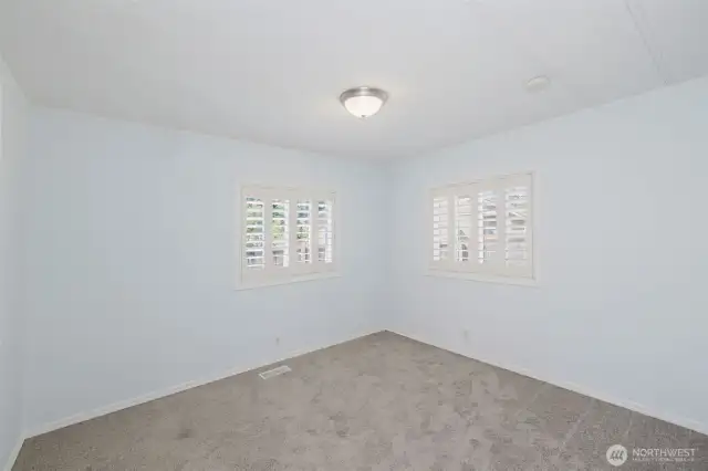 Second bedroom located on the front side of the house.