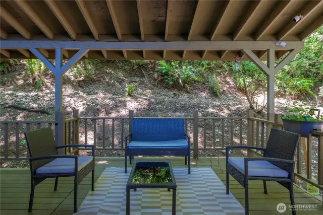 Covered back porch off primary bedroom